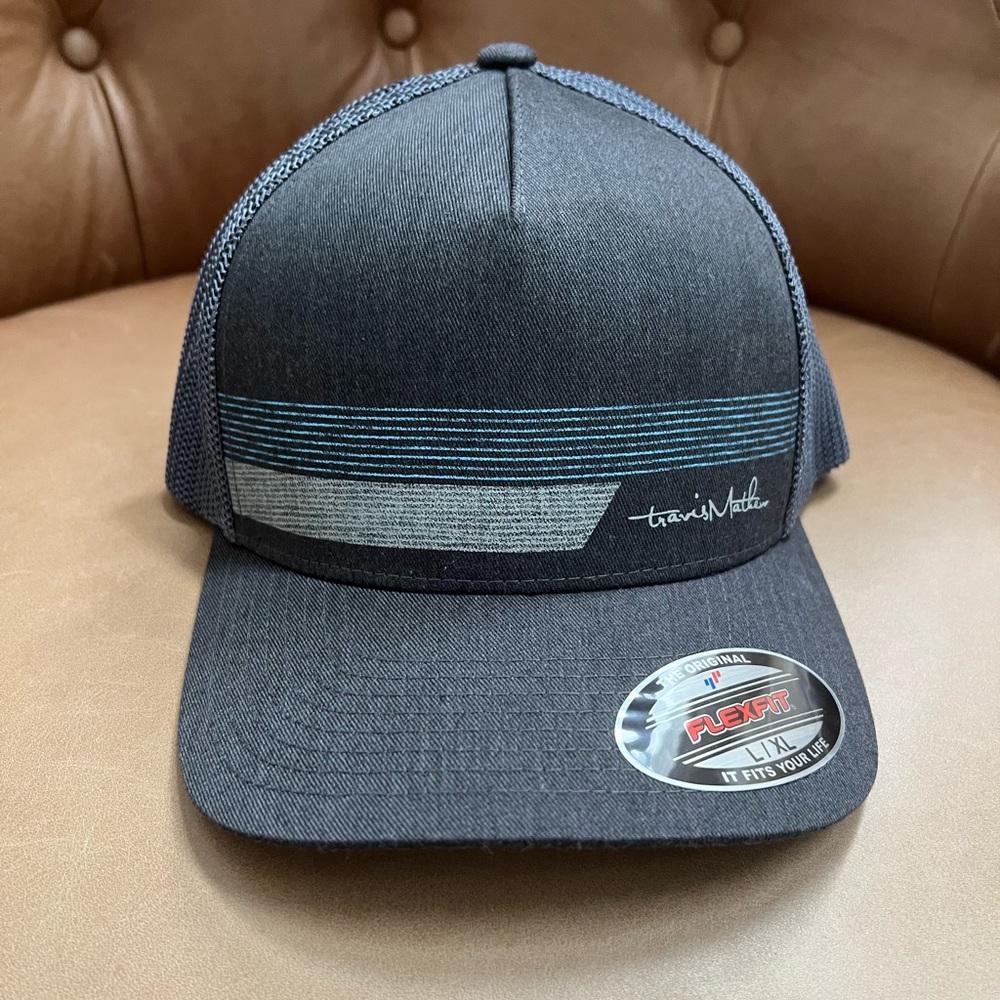 Travis Matthew hat. Gray with blue tones. Mesh back.
